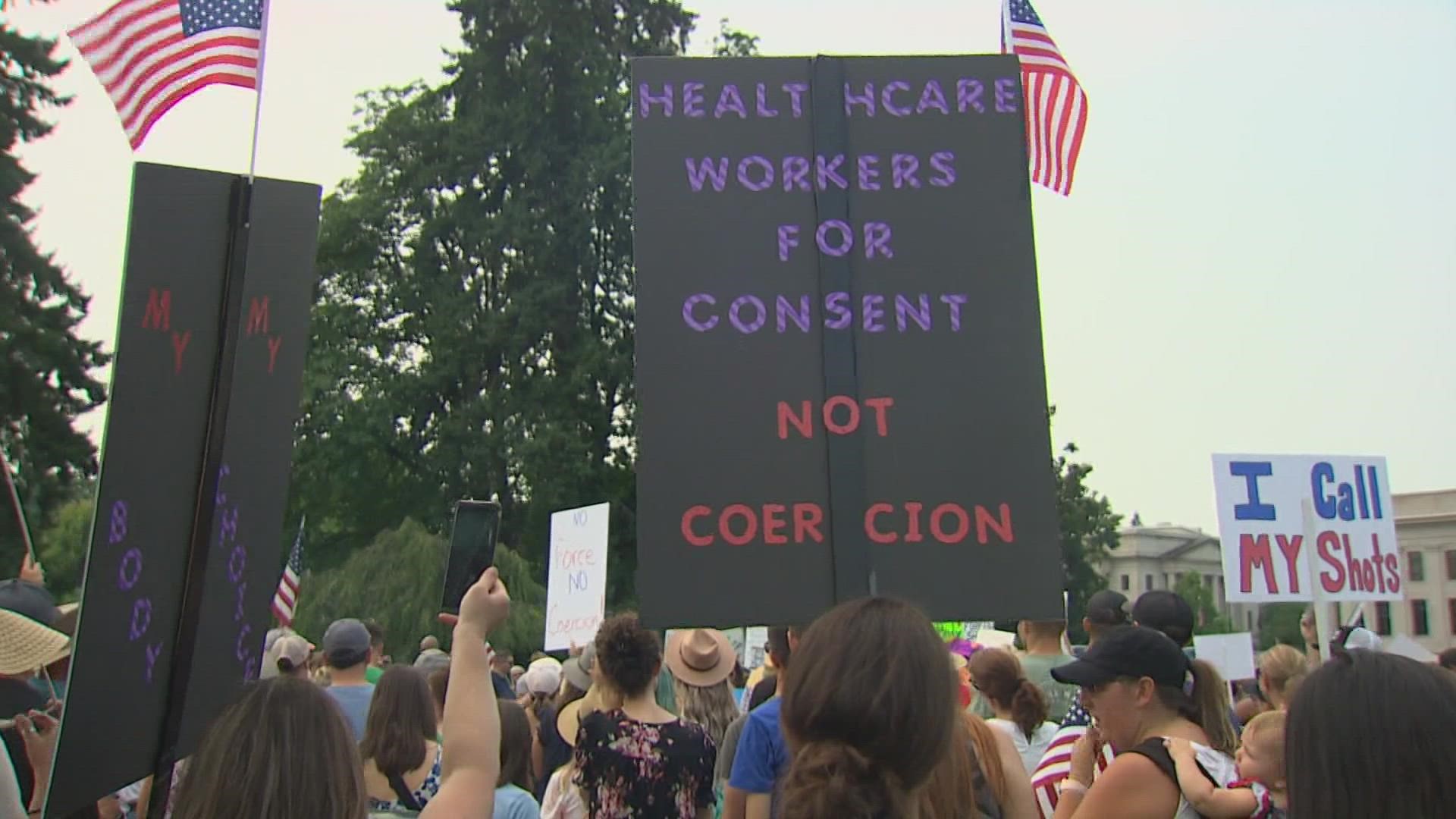 Hundreds of protesters met at the state capitol Friday, saying they are willing to give up their jobs before they follow Gov. Jay Inslee's vaccine mandate.