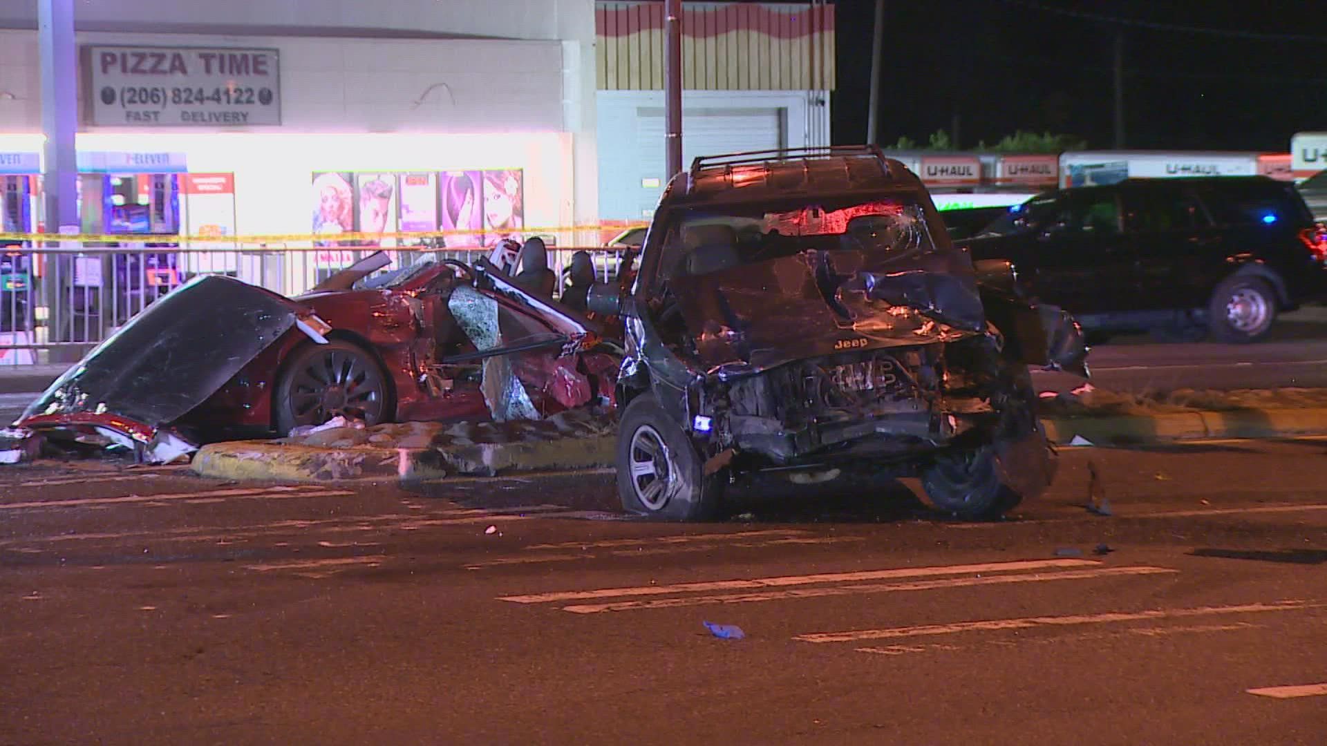 A Jeep Cherokee ran a red light and hit a Tesla at an intersection in Seatac early Monday morning. The Jeep driver then fled from the scene on foot.