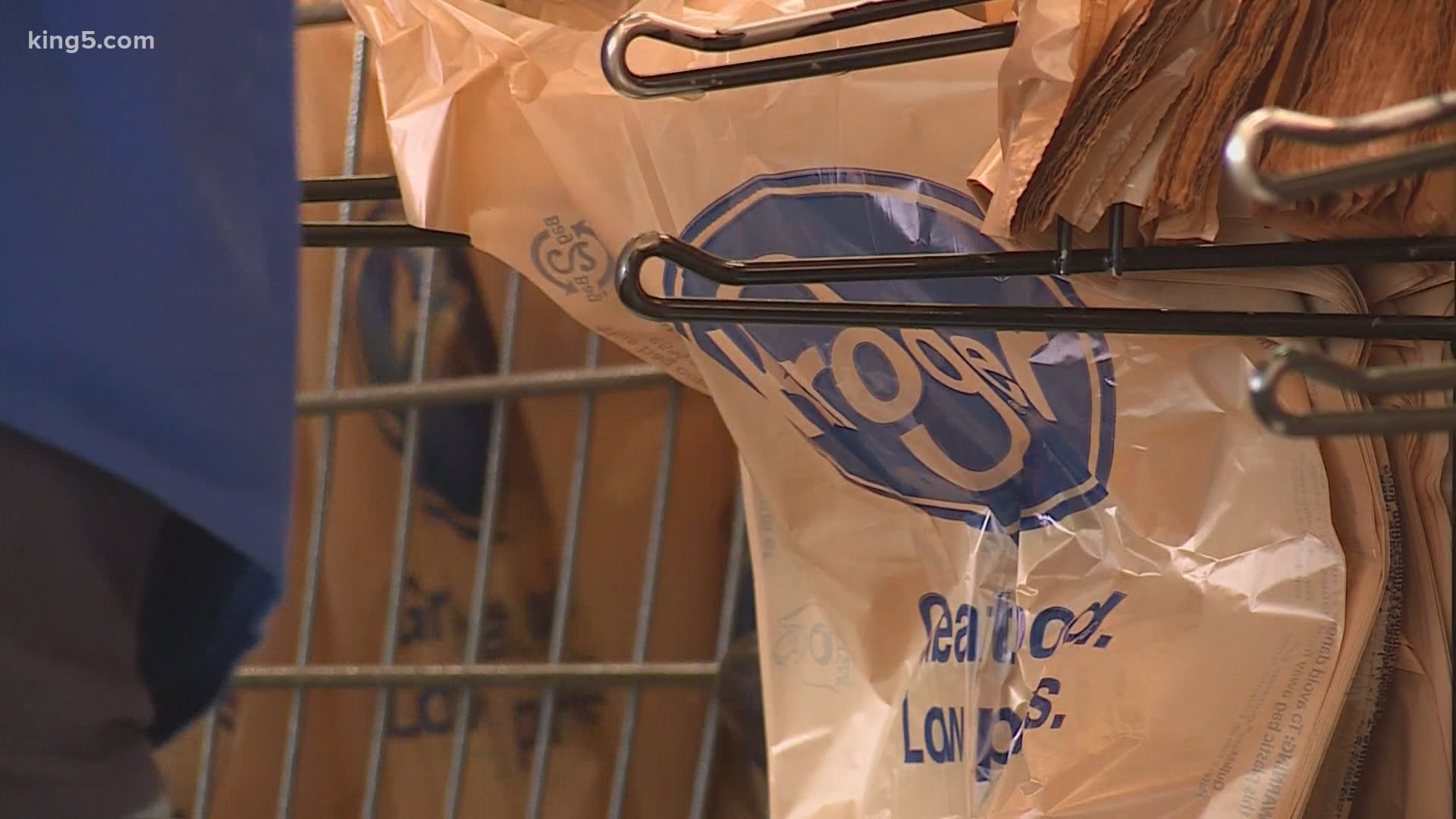 The parent company of QFC and Fred Meyer will pay $100 to employees who get fully vaccinated against COVID-19.