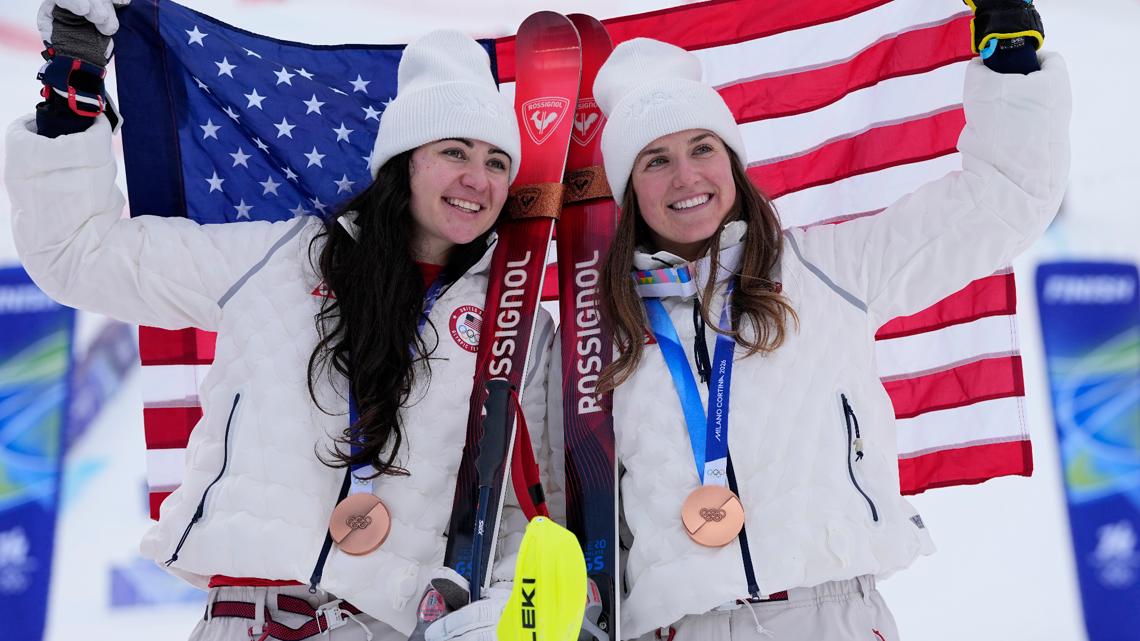 United States' Jacqueline Wiles, left, and teammate Paula Moltzan show their bronze medals in an alpine ski women's combined race on Feb. 10, 2026.