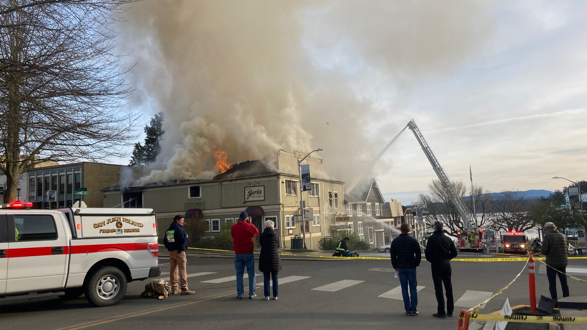 A large fire broke out in downtown Friday Harbor early Thursday morning and crews continued to battle it several hours later.