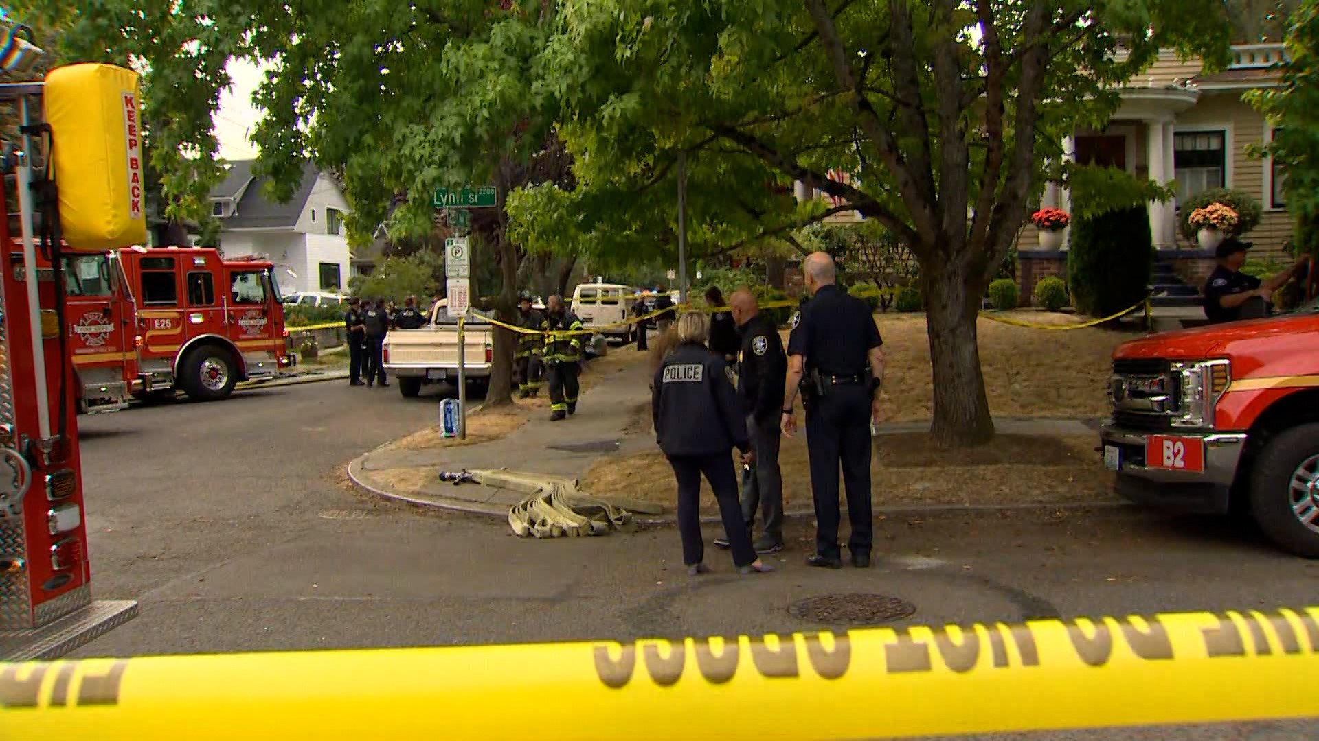 At least two people are deceased after a man  "in crisis" armed with a knife was encountered by Seattle police at a burning house in the Montlake neighborhood