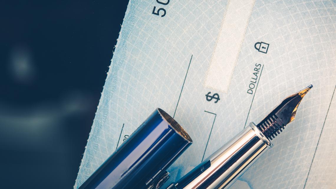 Olympia couple charged after cashing $10,000 health department check mailed to wrong address