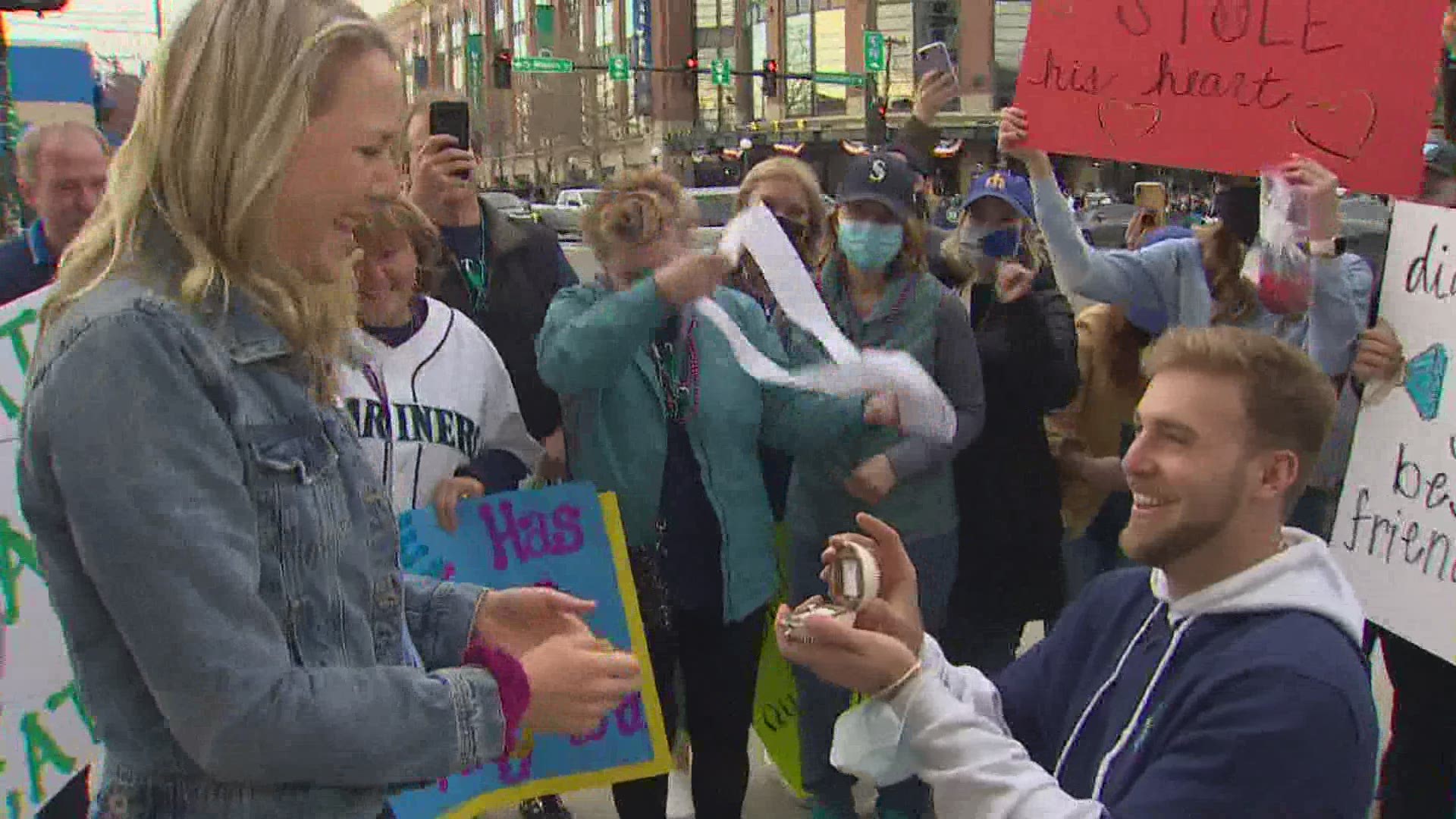 Brandon and Katie will never forget the Mariners 2021 Opening Day. The Seattle couple engaged outside T-Mobile Park before the game.