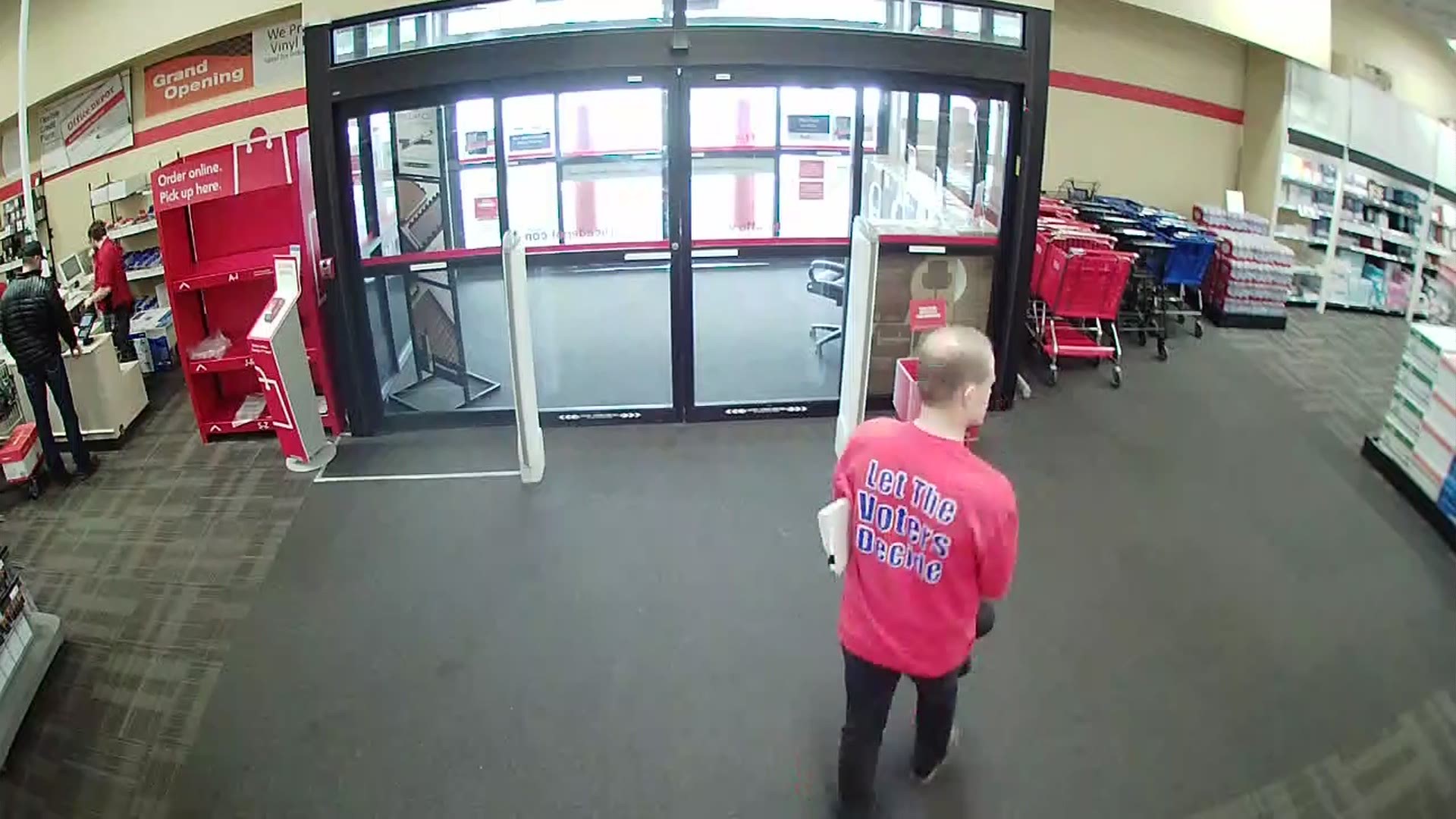 Surveillance footage provided by Lacey Police shows Tim Eyman walking out of Office Depot with a $70 chair he didn't pay for.