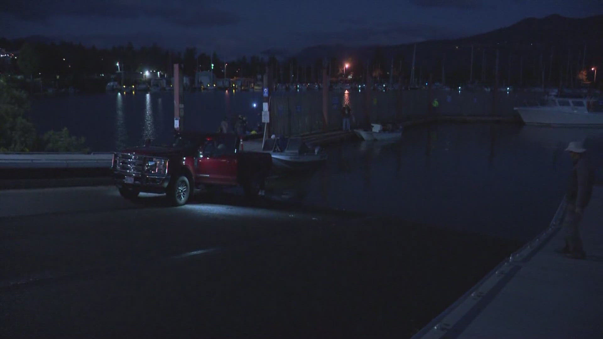 Six of the people onboard a fishing boat that capsized near the mouth of the White Salmon River were pulled out of the water, but a seventh person remains missing.