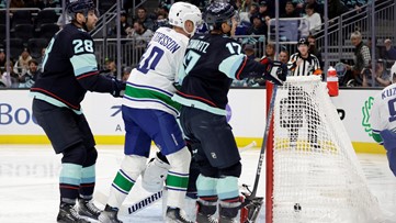 Canucks end season-opening skid at 7, beating Kraken 5-4