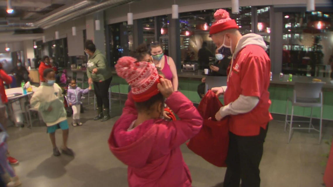 Macklemore surprises families at Mary's Place shelter with Christmas gifts