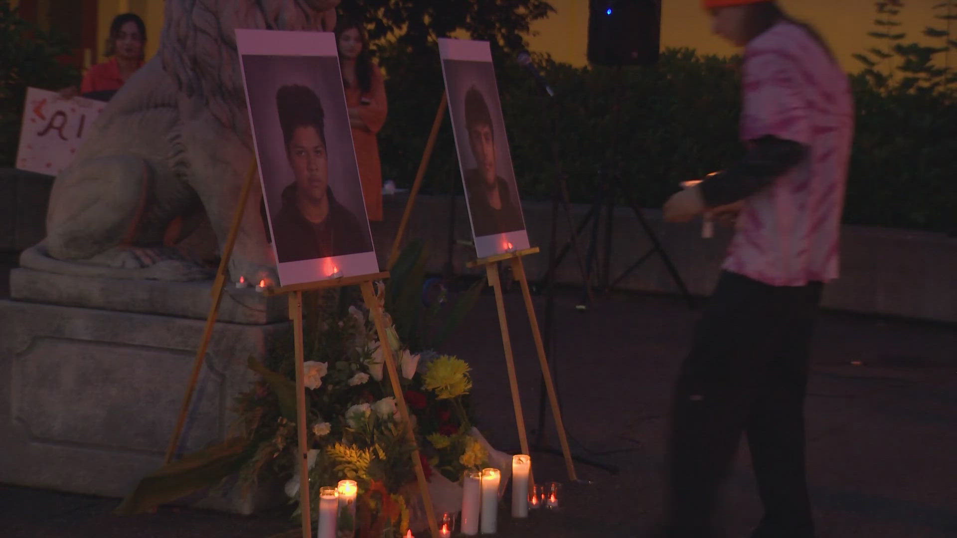 At a vigil held at the high school courtyard, community members remembered the victims, 17-year-old Ali Rohani and 18-year-old Cris Zelaya.