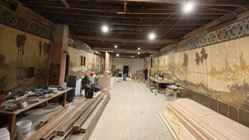 PHOTOS: Century-old handpainted mural found inside historic Okanogan building