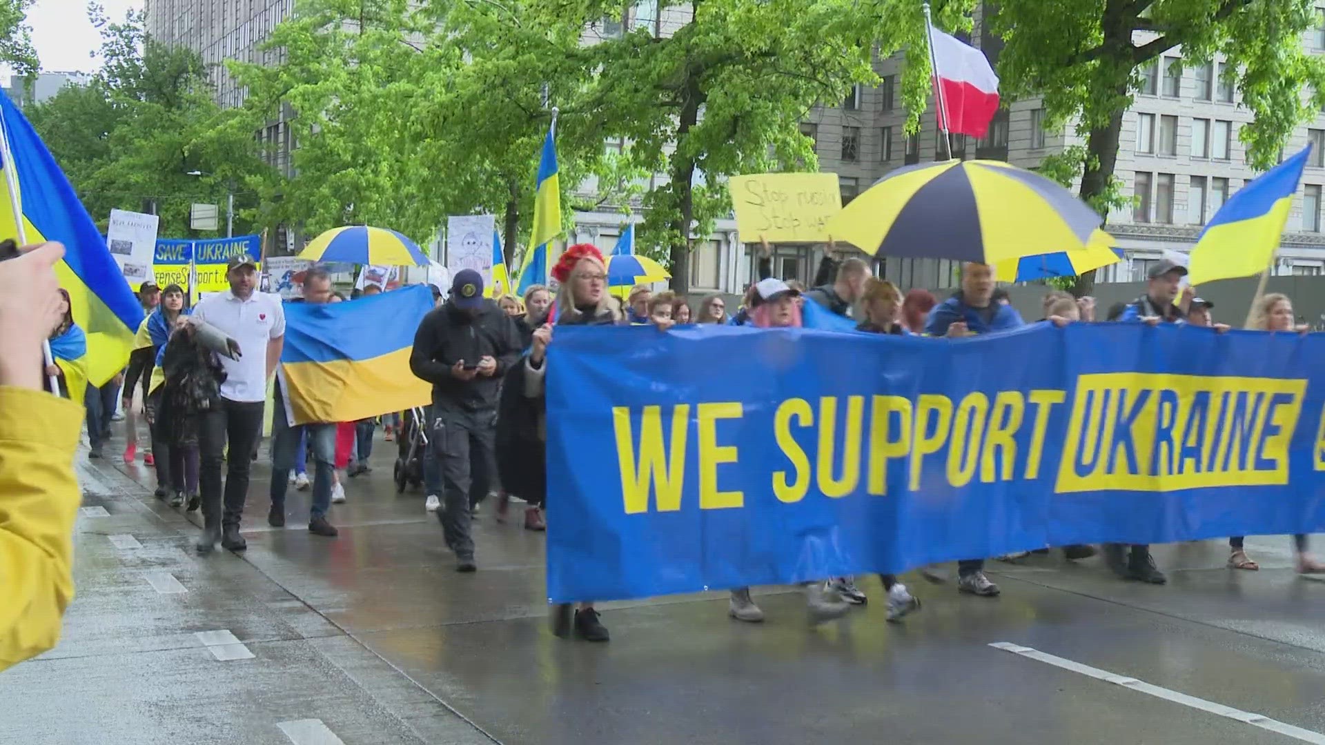 The rally was held on the steps of Seattle City Hall on Saturday.