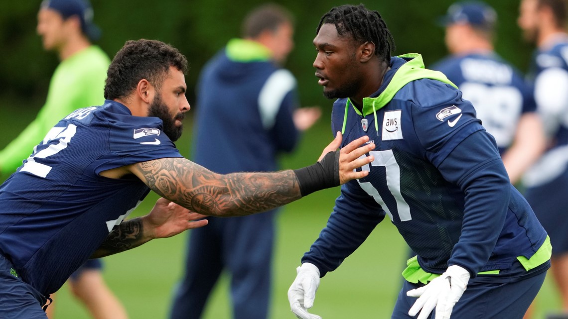 Seattle Seahawks offensive tackle Abraham Lucas (72) gets set