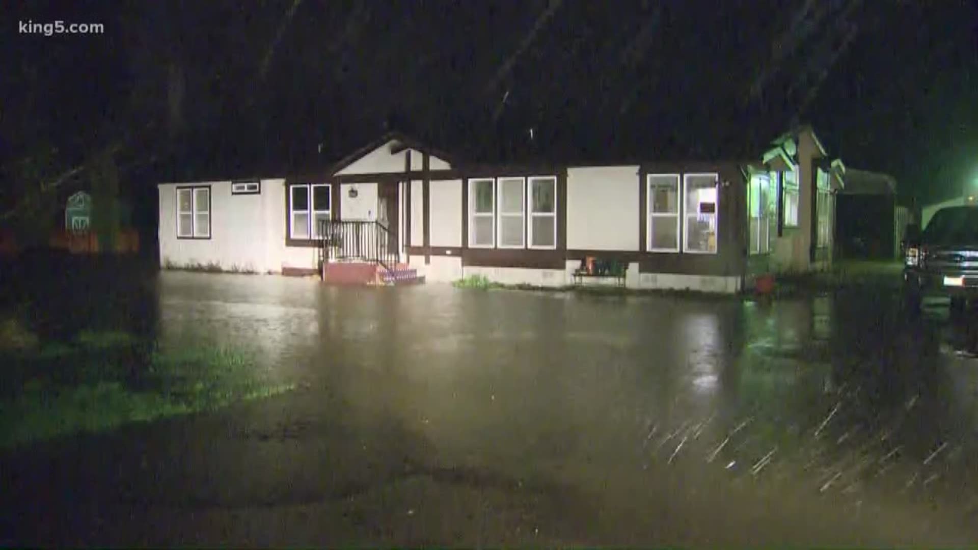 The Thurston County Dive Rescue Team helped eight people and six dogs to safety from a home flooded in the Nisqually Delta area.