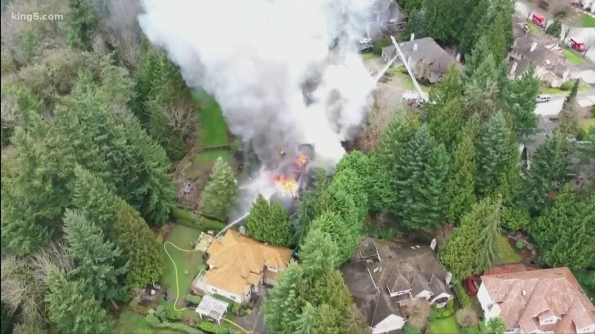 Two children, a woman and a man are safe after a hostage situation that led to a house fire in Issaquah's Montreux neighborhood last night.