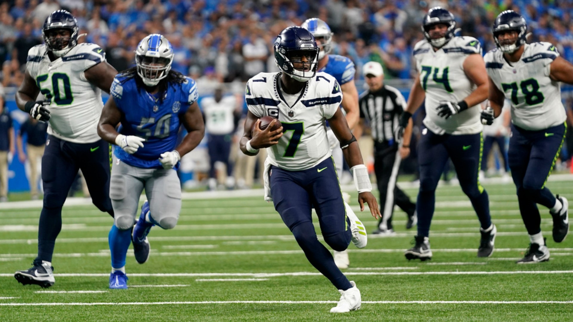 Facing pressure after a big mistake, Smith quieted the Lions crowd with a surgical drive to win the Seahawks' first game.