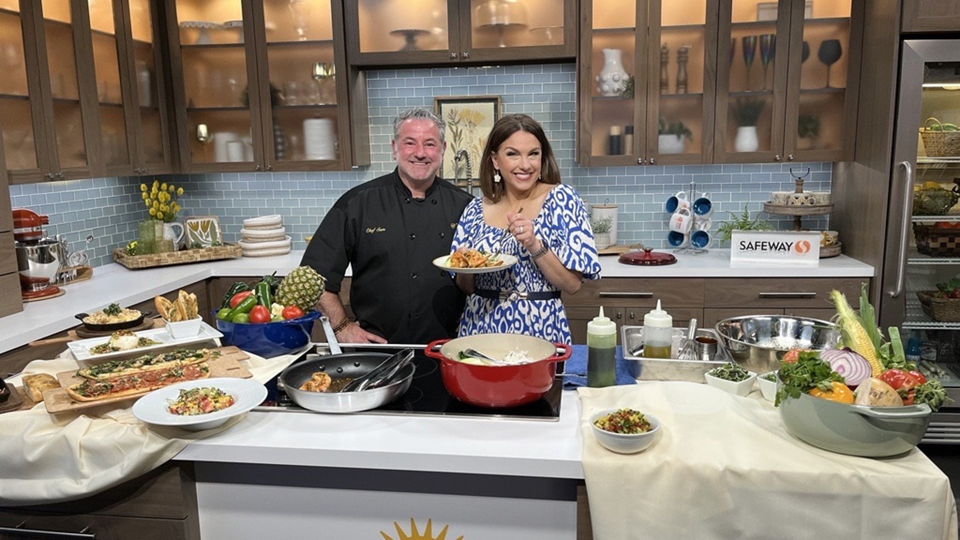 Chef Sam Litvak prepares jumbo shrimp while talking about the opening of their new restaurant Evergreen Point Bistro. #newdaynw