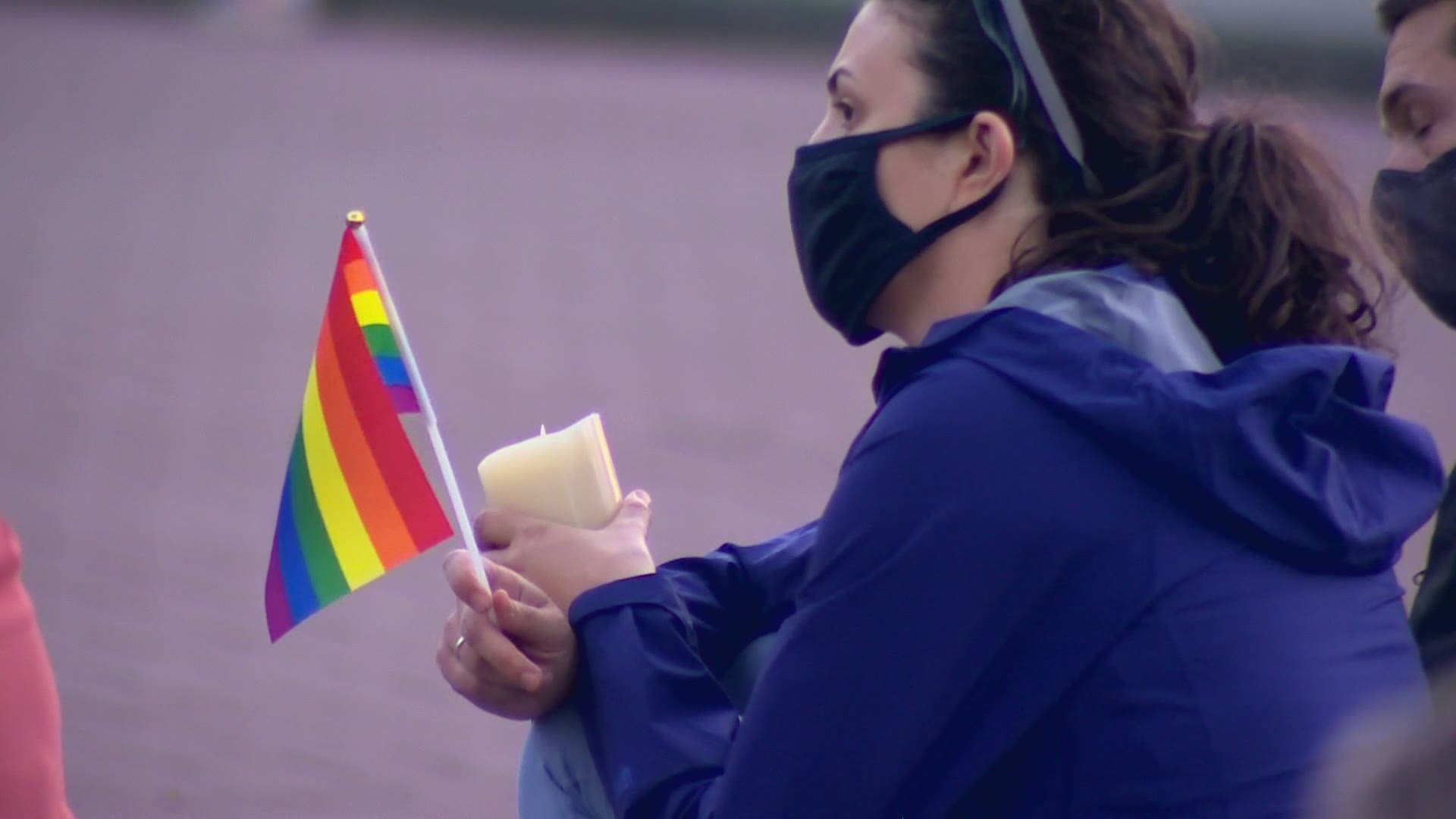 Students held a vigil while faculty consider a "vote of no confidence" after the Board of Trustees affirmed an employment policy against LGBTQ relationships.