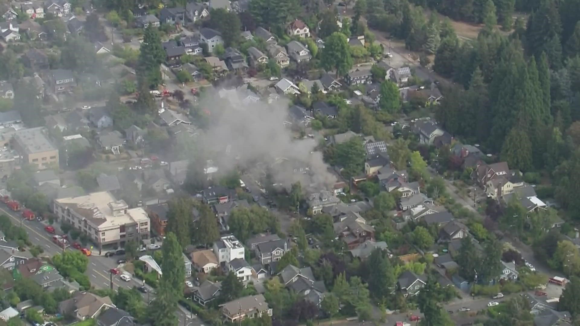 Officers responded to a man "possibly in crisis" who was armed with a knife inside a burning home in Seattle's Montlake neighborhood