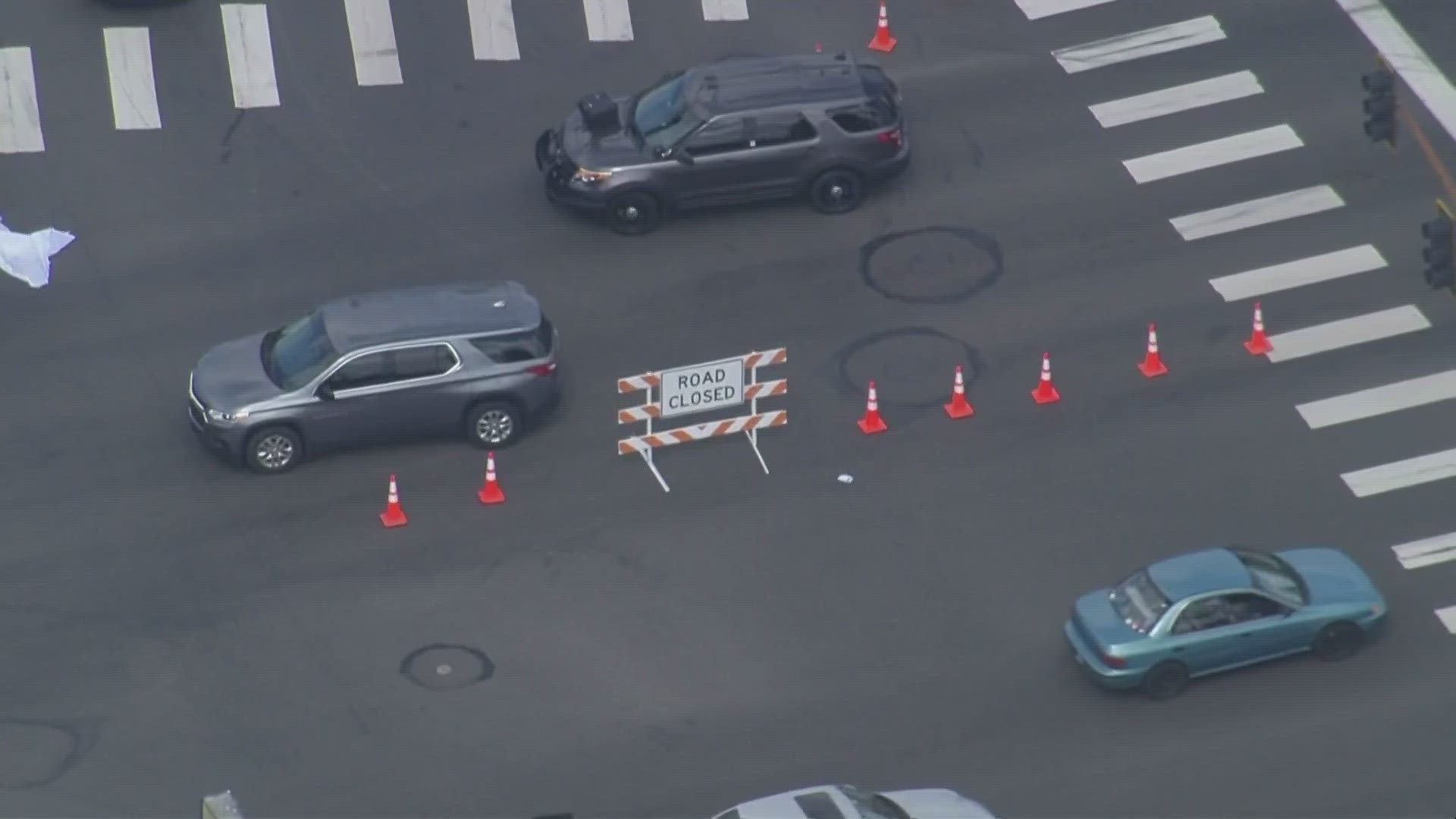 One man was killed after a car pulled up and fired shots at another at a stop light in Auburn.