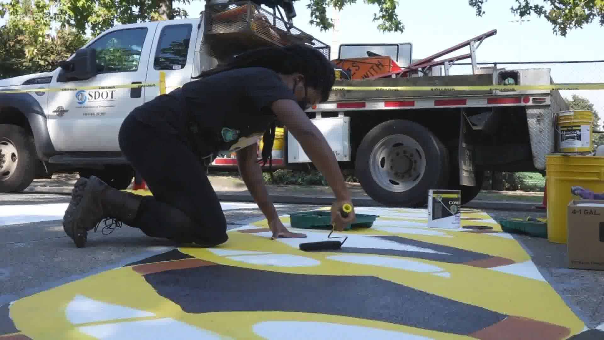 The Seattle Department of Transportation is helping artists preserve a giant Black Lives Matter mural on a street in the former CHOP/CHAZ zone of Capitol Hill.