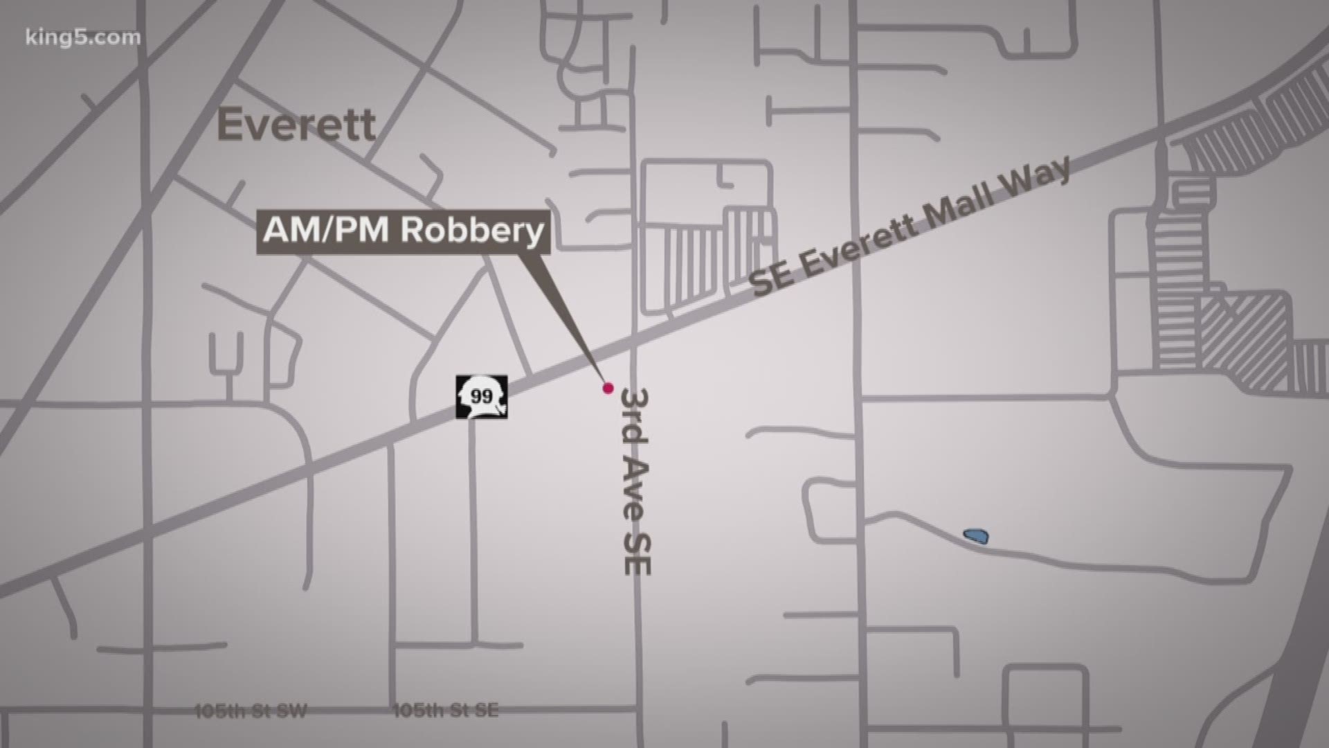 Police are searching for a suspect accused of robbing an Everett convenience store at gunpoint Monday morning.