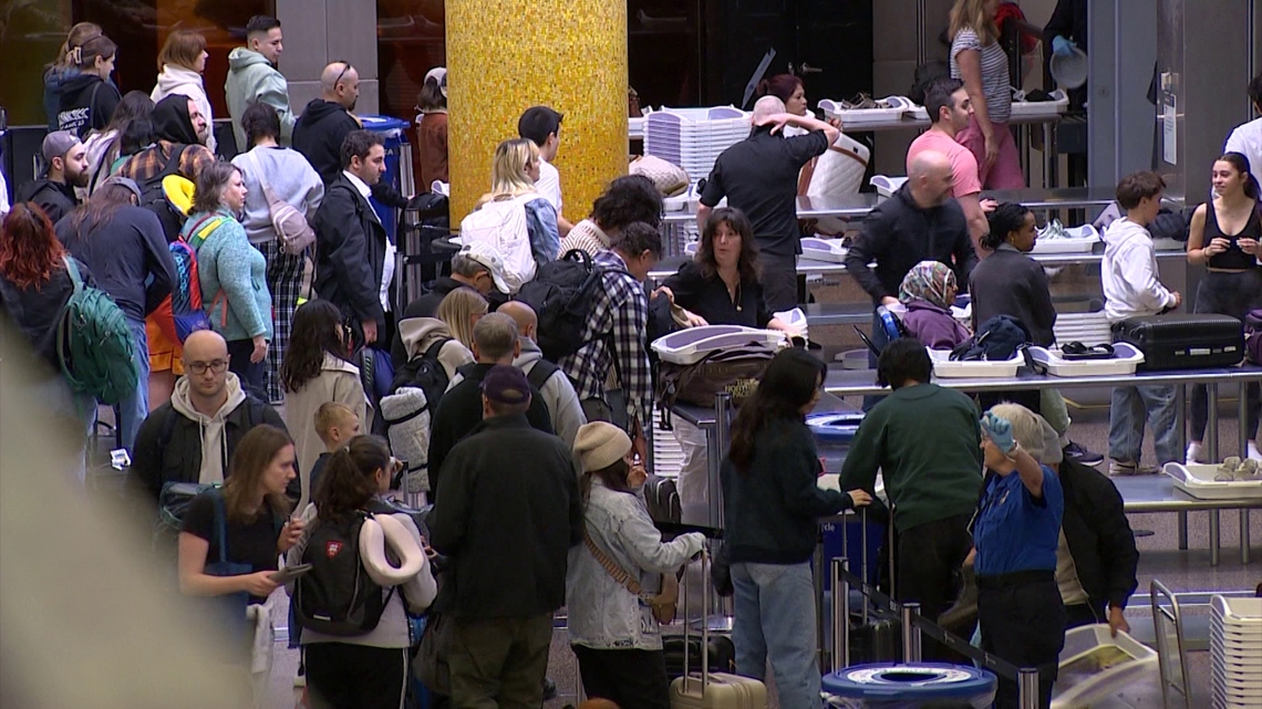 When is the busiest spring break travel day at SEA Airport?