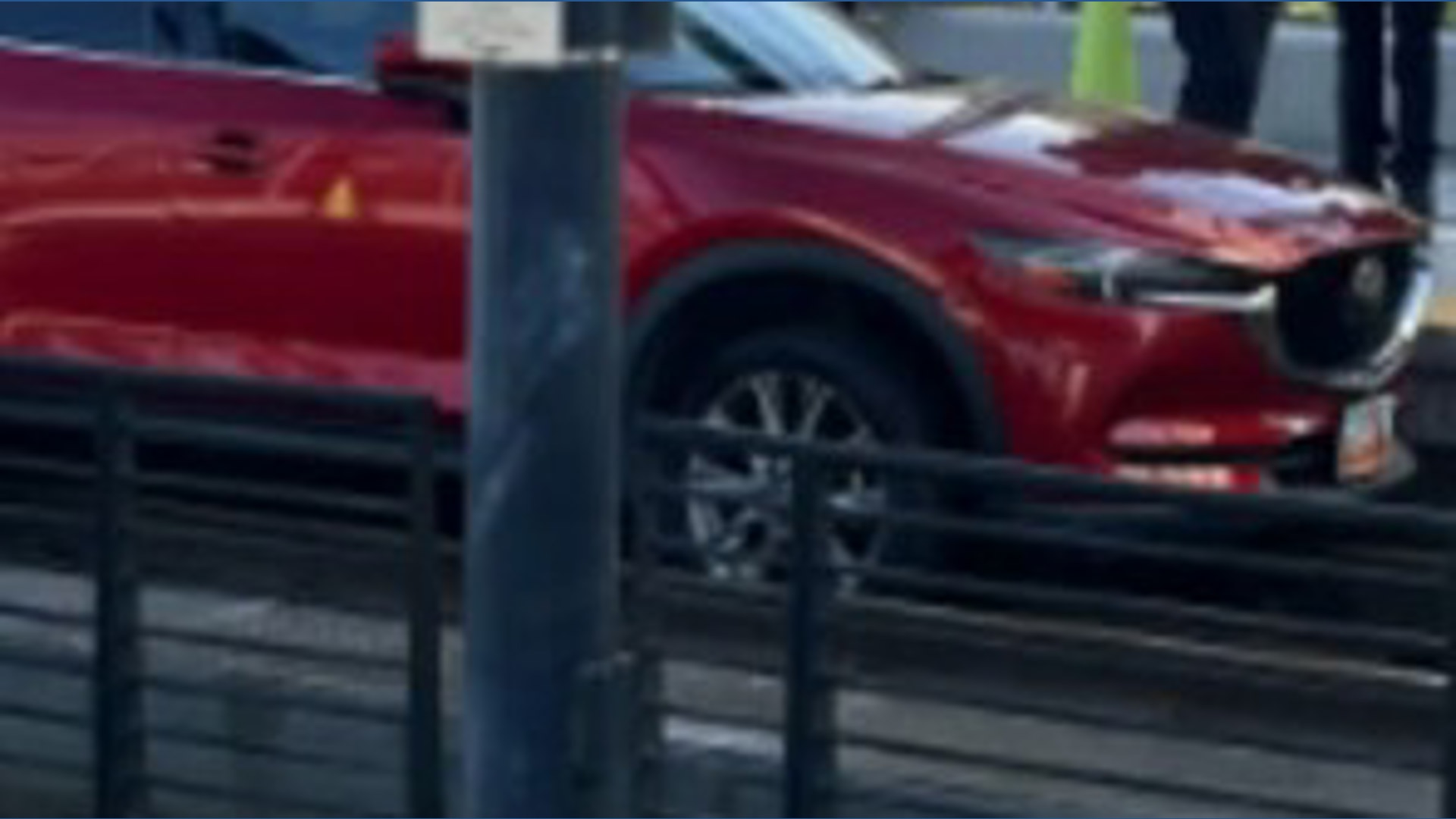 Car drives onto light rail tracks in Seattle | king5.com