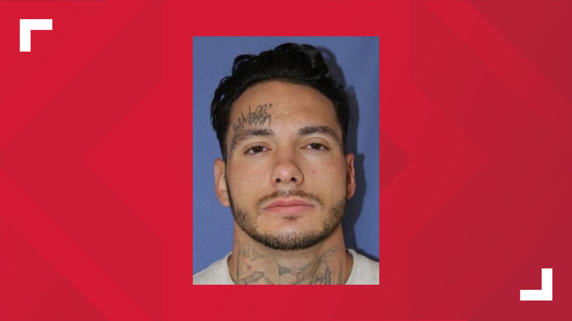 The suspect is wanted on outstanding warrants and for allegedly firing an AR-15 at officers on May 8.