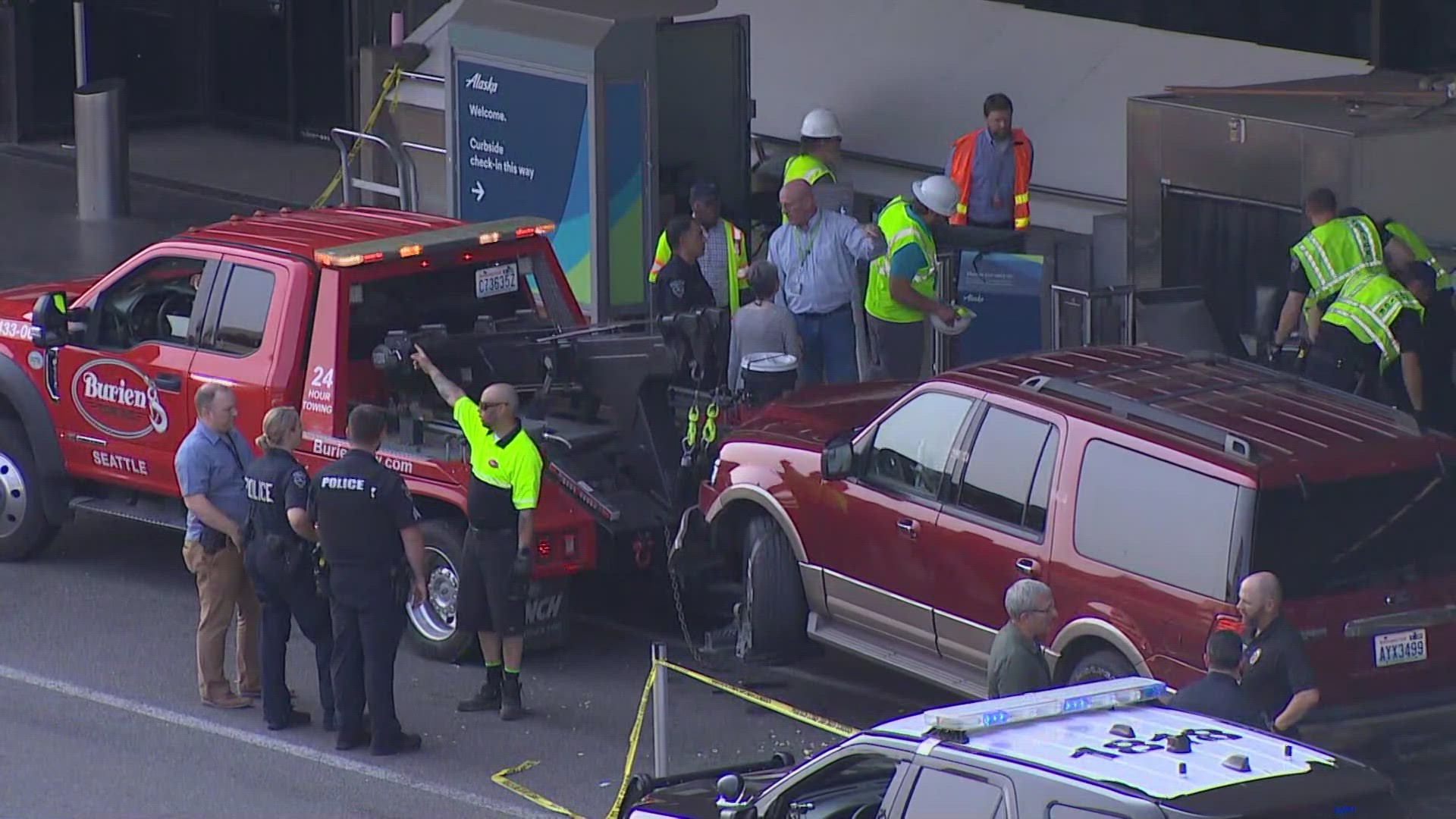 Three people were injured after a car crash in the departures area at Seattle-Tacoma International Airport Wednesday afternoon.