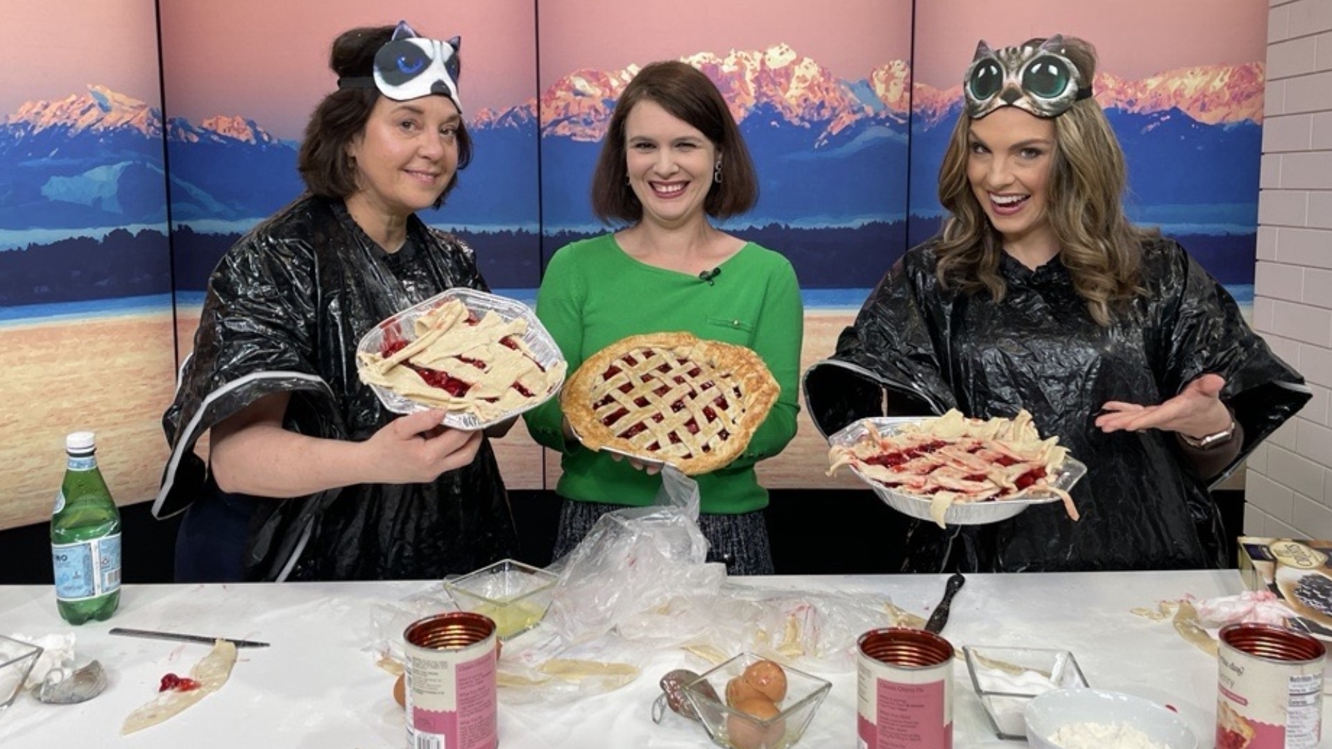 Producer Suzie Wiley and Amity celebrate Pi Day by making pies while blindfolded. #newdaynw