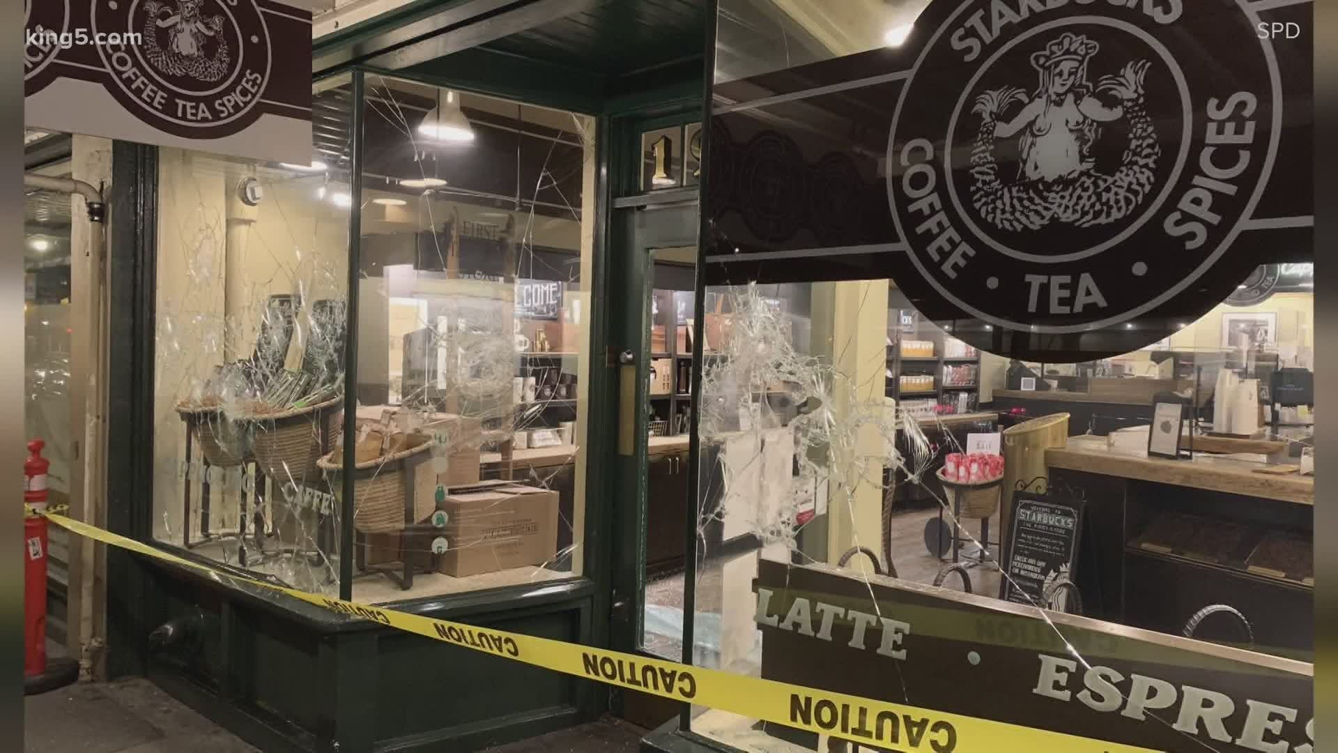 Several businesses, including the original Starbucks at Pike Place Market, were damaged and vandalized during protests Wednesday night.