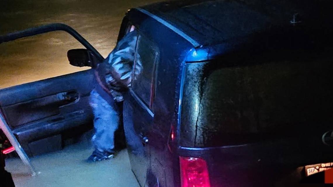 Driver, cat rescued from vehicle stuck in flood waters by West Mason Fire crews