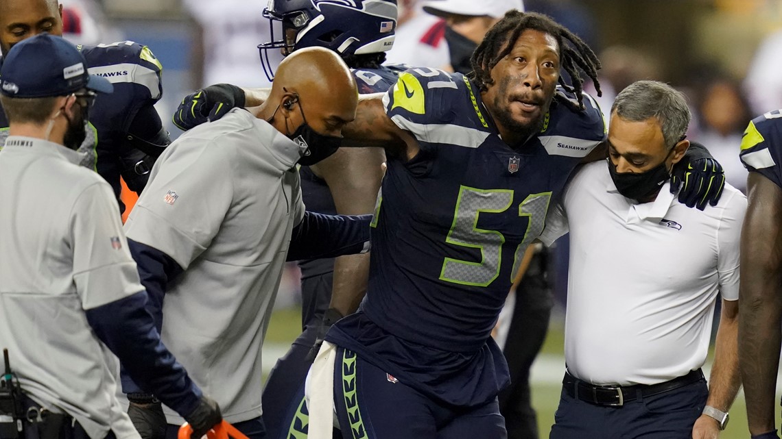 LB Bruce Irvin back with Seahawks, signs to practice squad