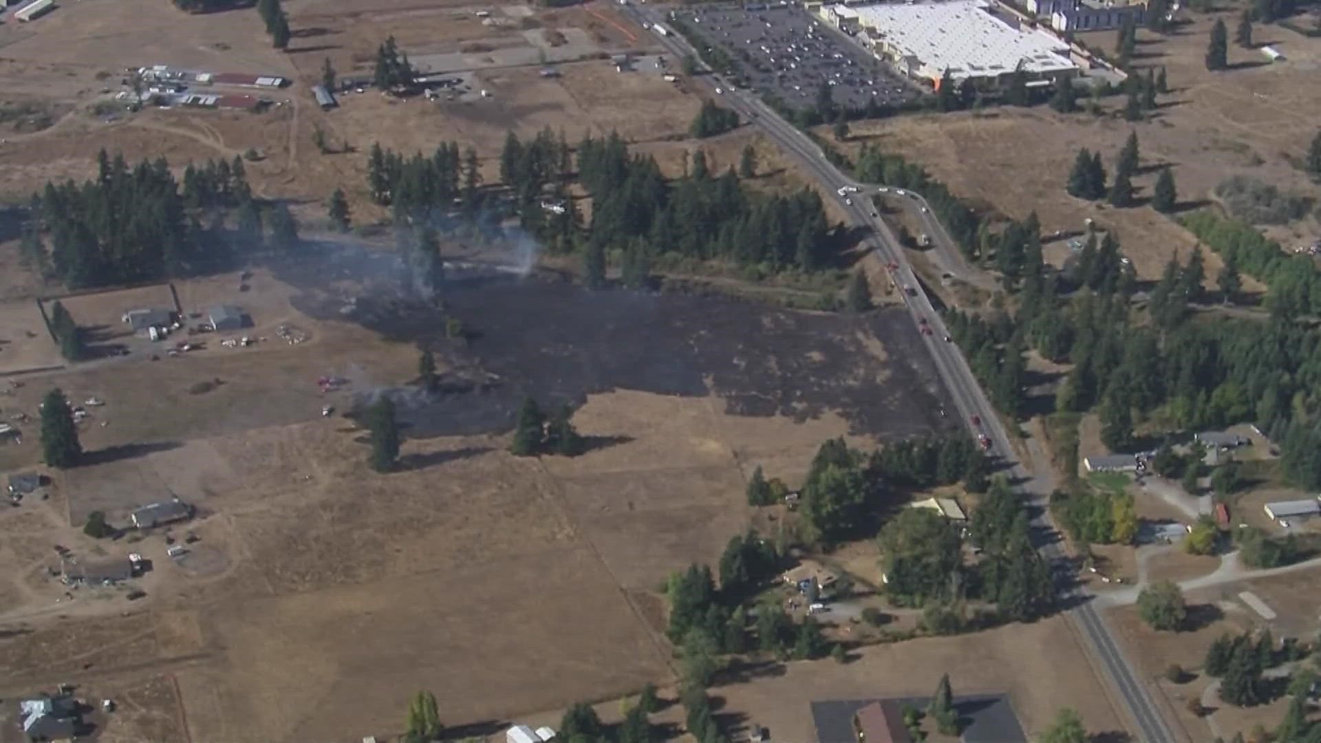 A brush fire broke out Wednesday off SR 507 in Yelm. A few houses were evacuated, but fire is now contained, East Thurston Co fire chief says.