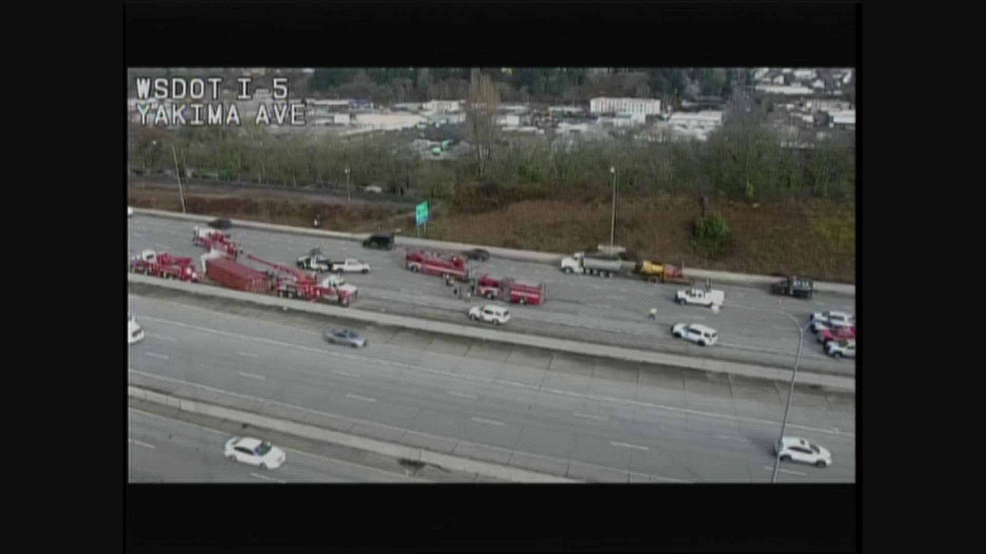 A crash involving a semi-truck blocked traffic on I-5 in Tacoma on March 8, 2023. Video: WSDOT.