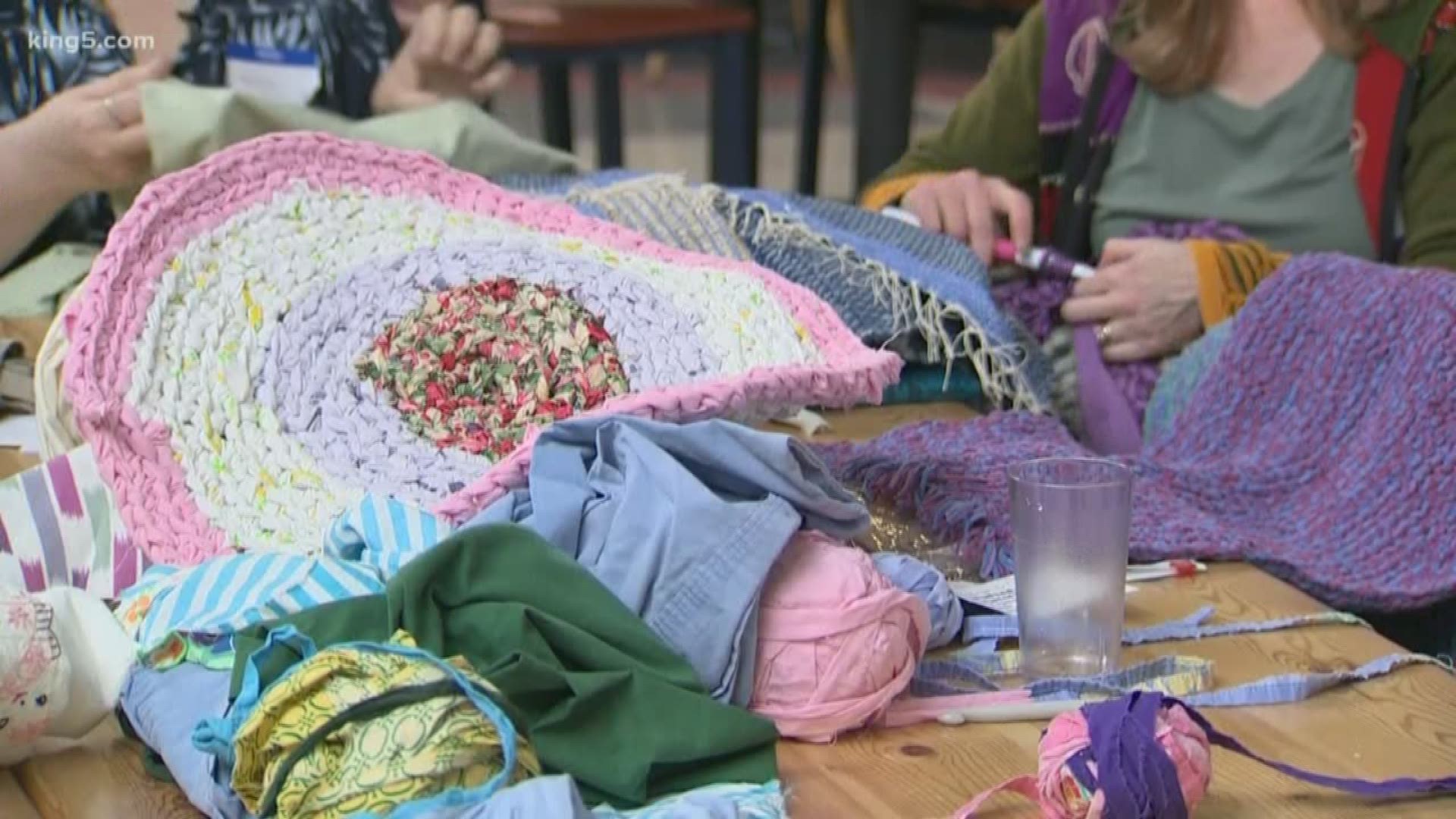 The rugs being crocheted at the Lake Forest Park out of recycled fabric are more than works of art. They're signs of compassion.