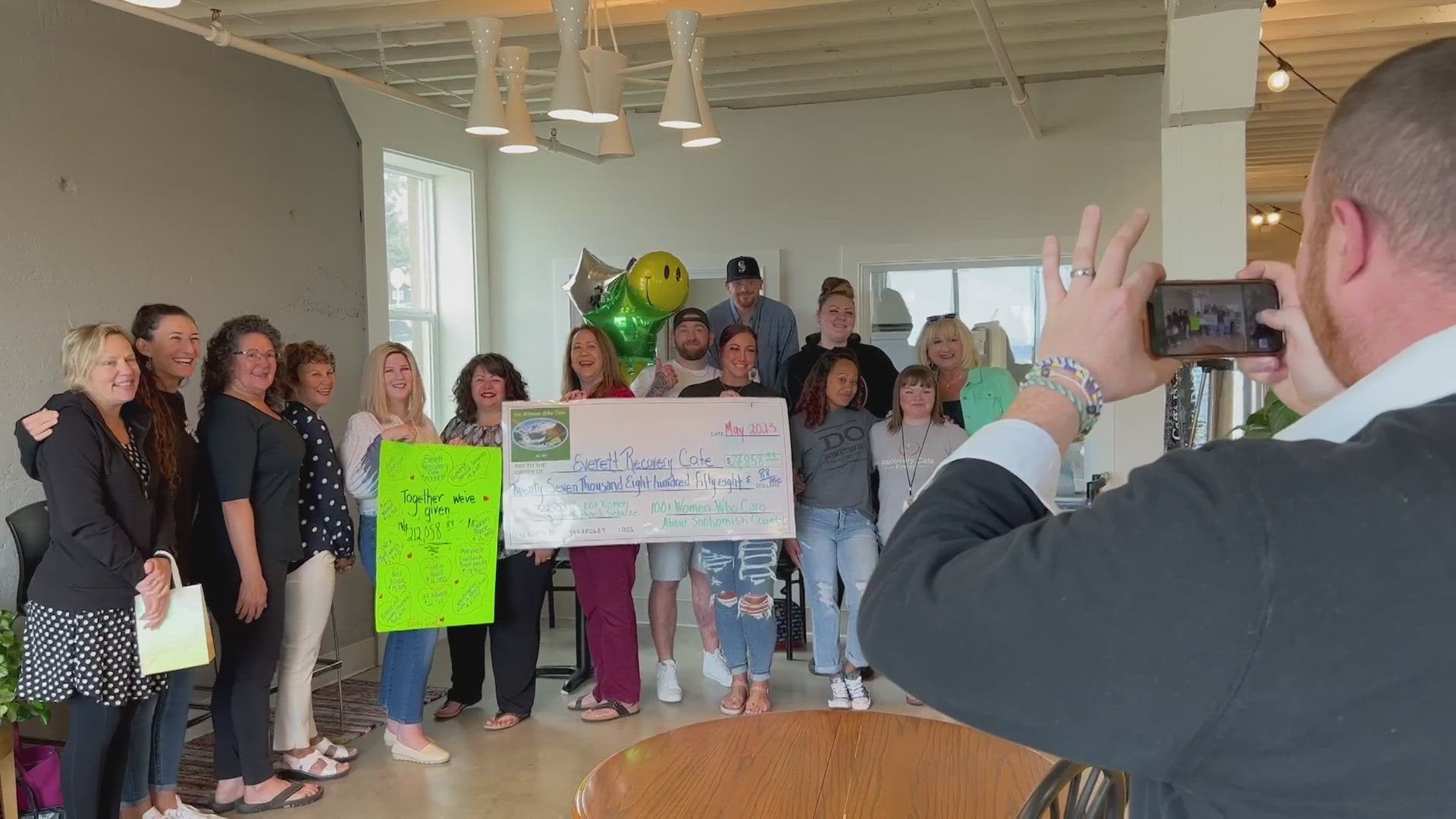 The group 100 Women Who Care just gave their biggest-ever donation of over $27,000 to Everett's Recovery Cafe.