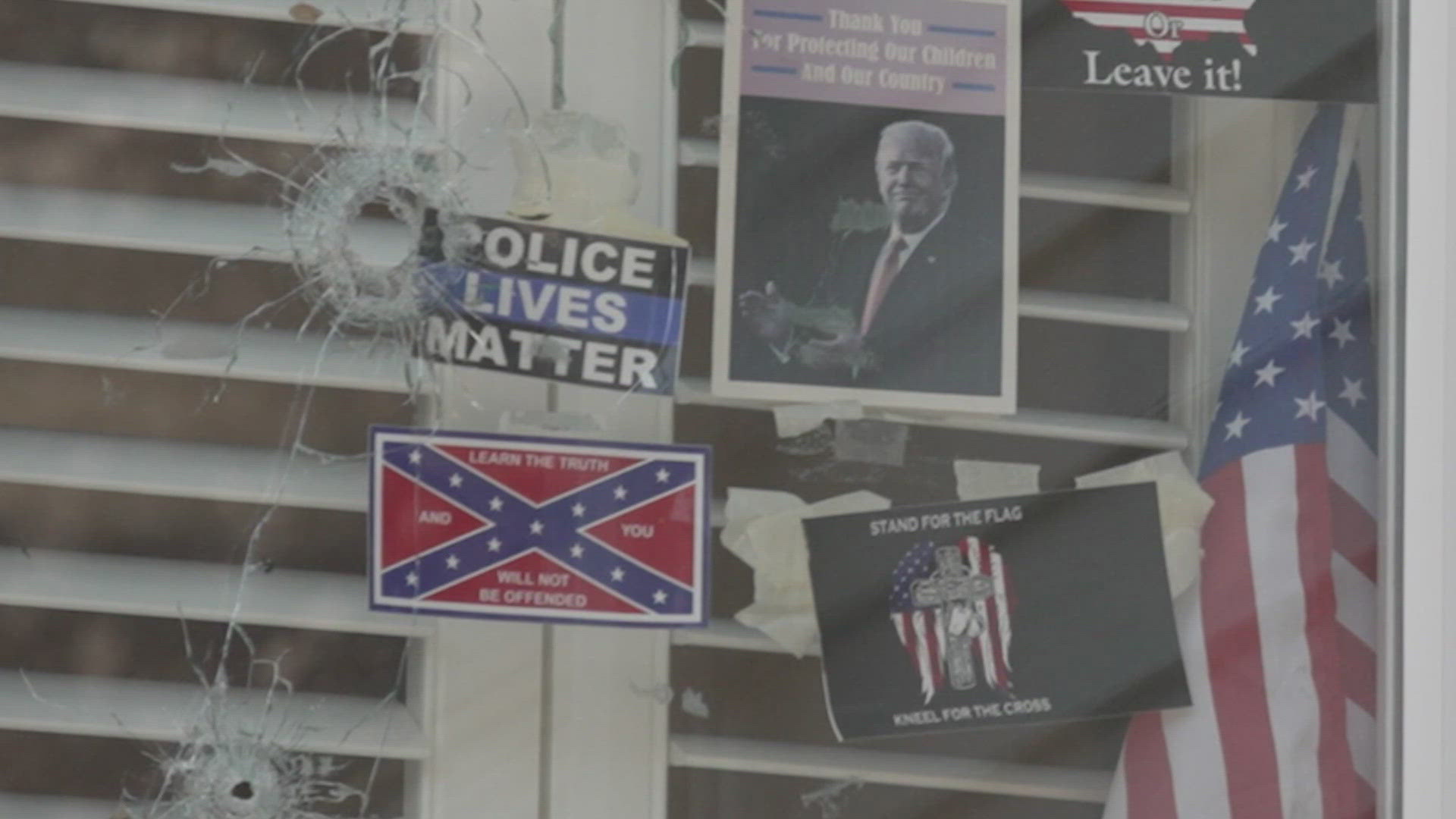 Police are searching for who shot at a Ballard resident's window, which displayed a Confederate flag sticker, President Trump's image and other political signs.