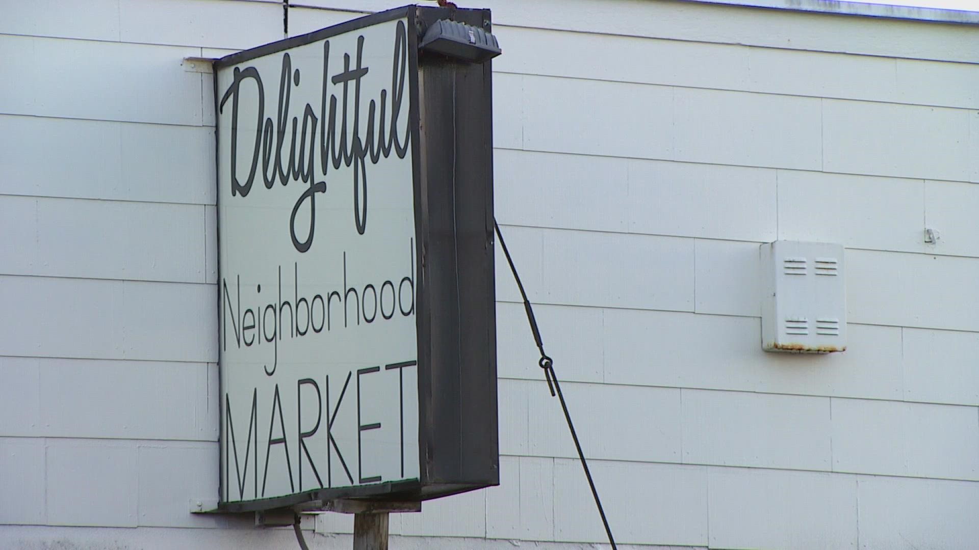 The Delightful Neighborhood Market is one of several businesses in the Tacoma area with boarded windows due to crime.