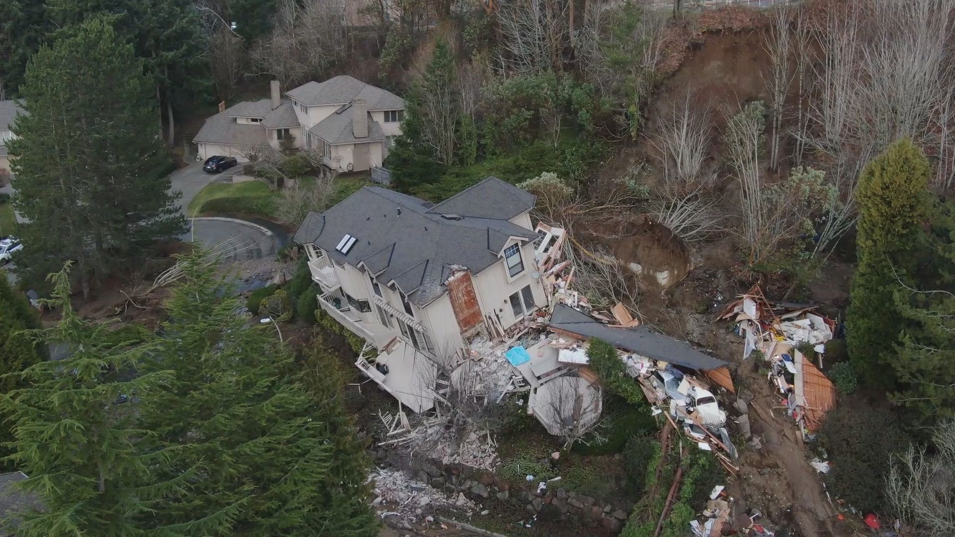 One of KING 5's drones captured an aerial view of the wreckage after a home slid off its foundation and collapsed in Bellevue on Jan. 17, 2022.