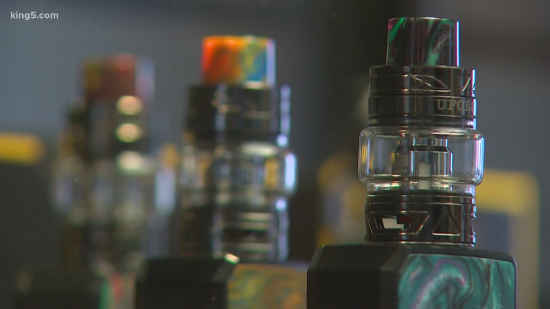 Some small vaping businesses say a bill that would raise the smoking age in Washington would take away a popular cessation device for adults under 21.