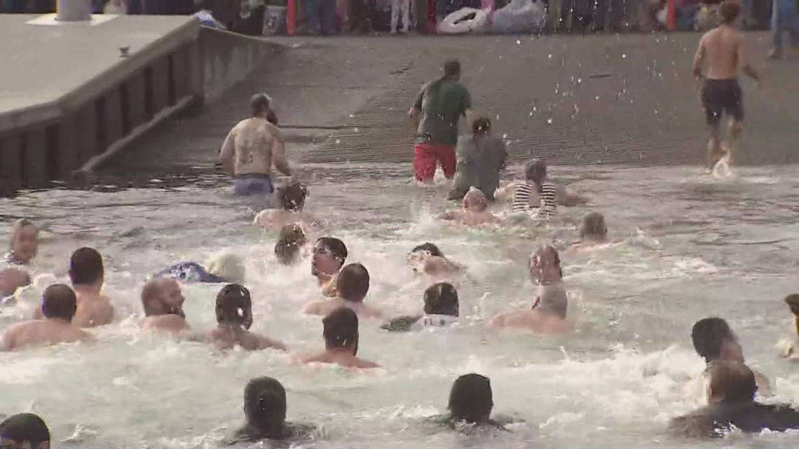 Hundreds start the new year off with a polar plunge at Point