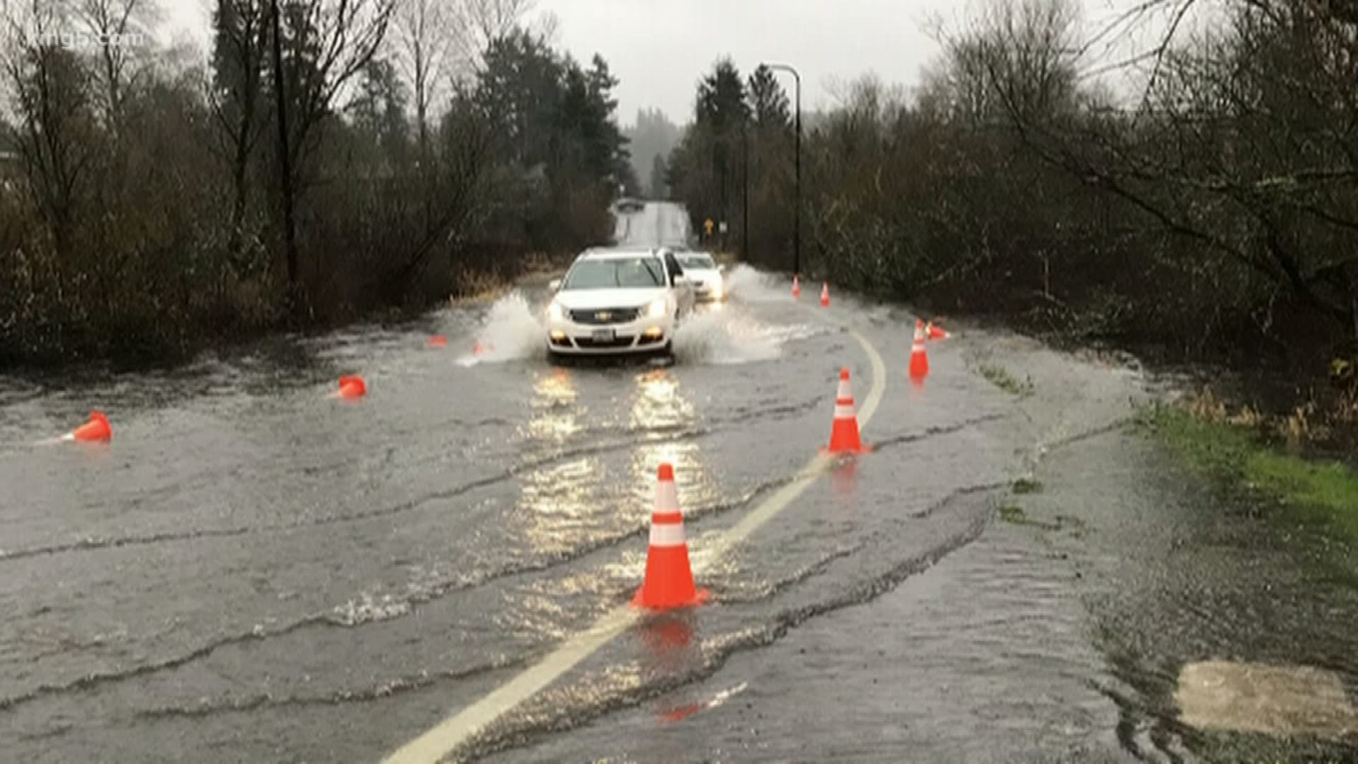 Several counties are under flood warnings. Roads in western Washington have closed due to high flood waters and a landslide stopped traffic in Renton.