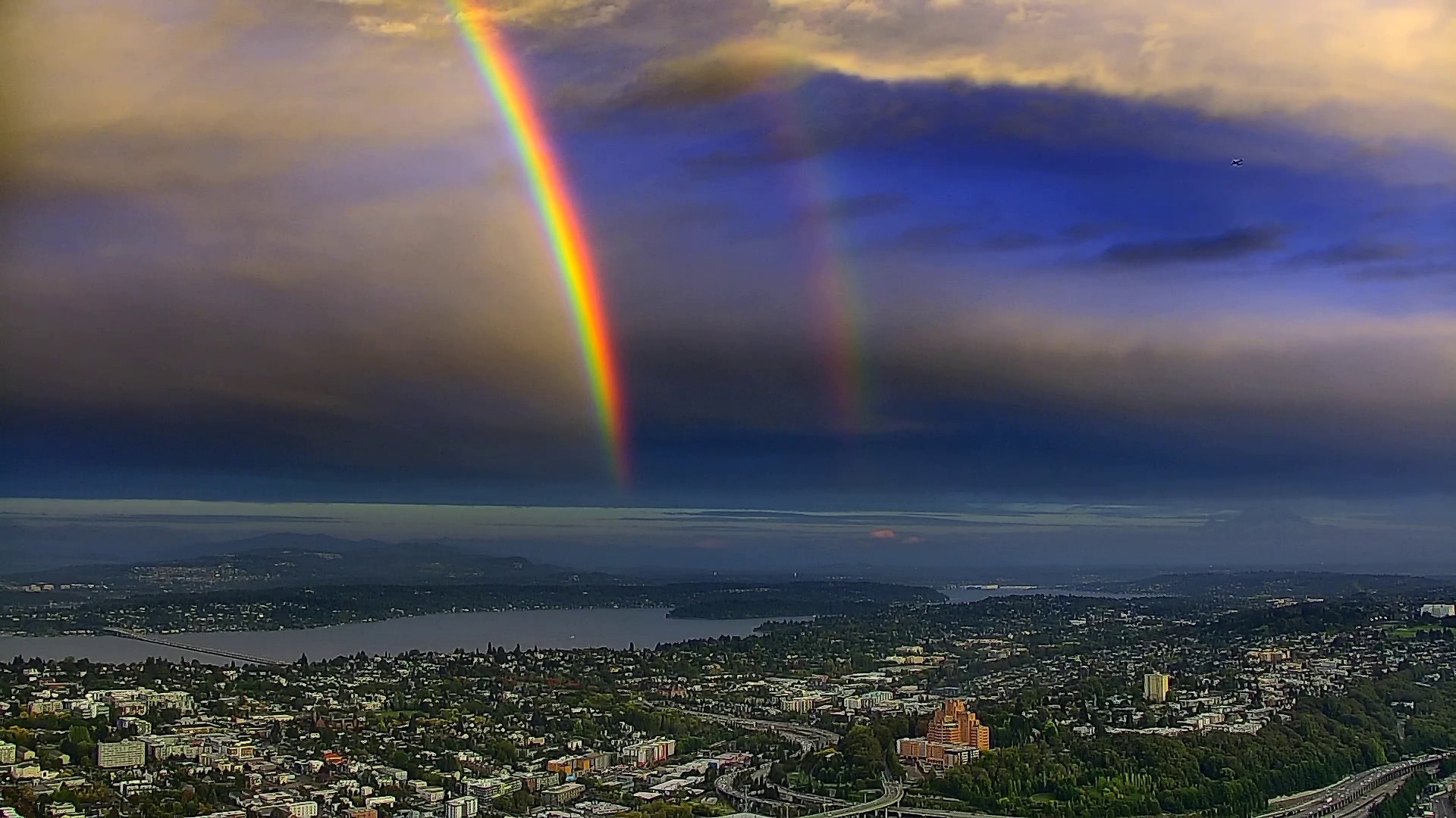 Double rainbow and a colorful sunset on Sept. 28, 2024, seen from KING 5's Columbia Tower camera.