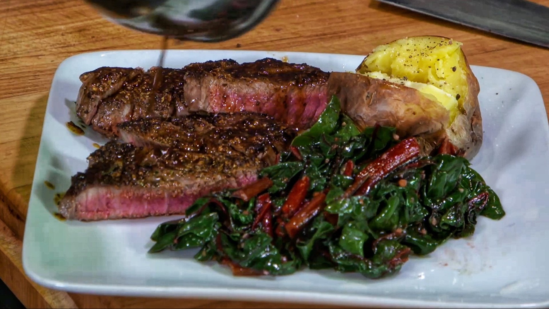 Chef Tom Douglas has a recipe for steak, baked potato and chard for those eating solo.