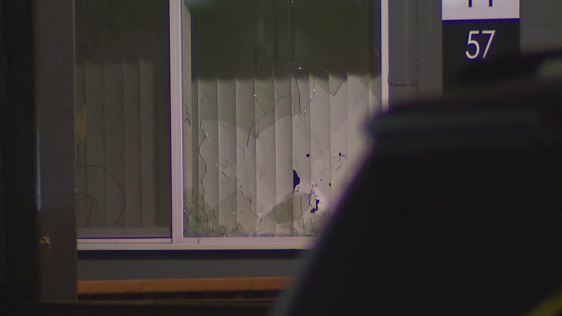 Woman shot in bed after bullets come through her apartment wall in ...