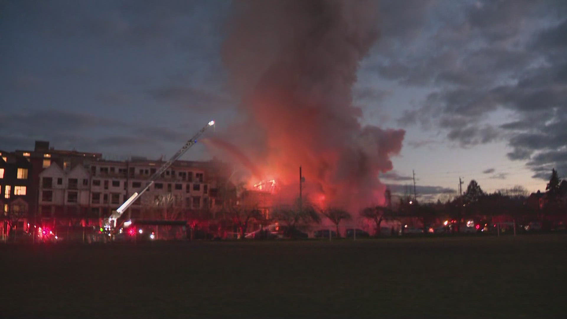 Seattle Fire Department crews battle 3 alarm fire at a building under construction in Ballard.
