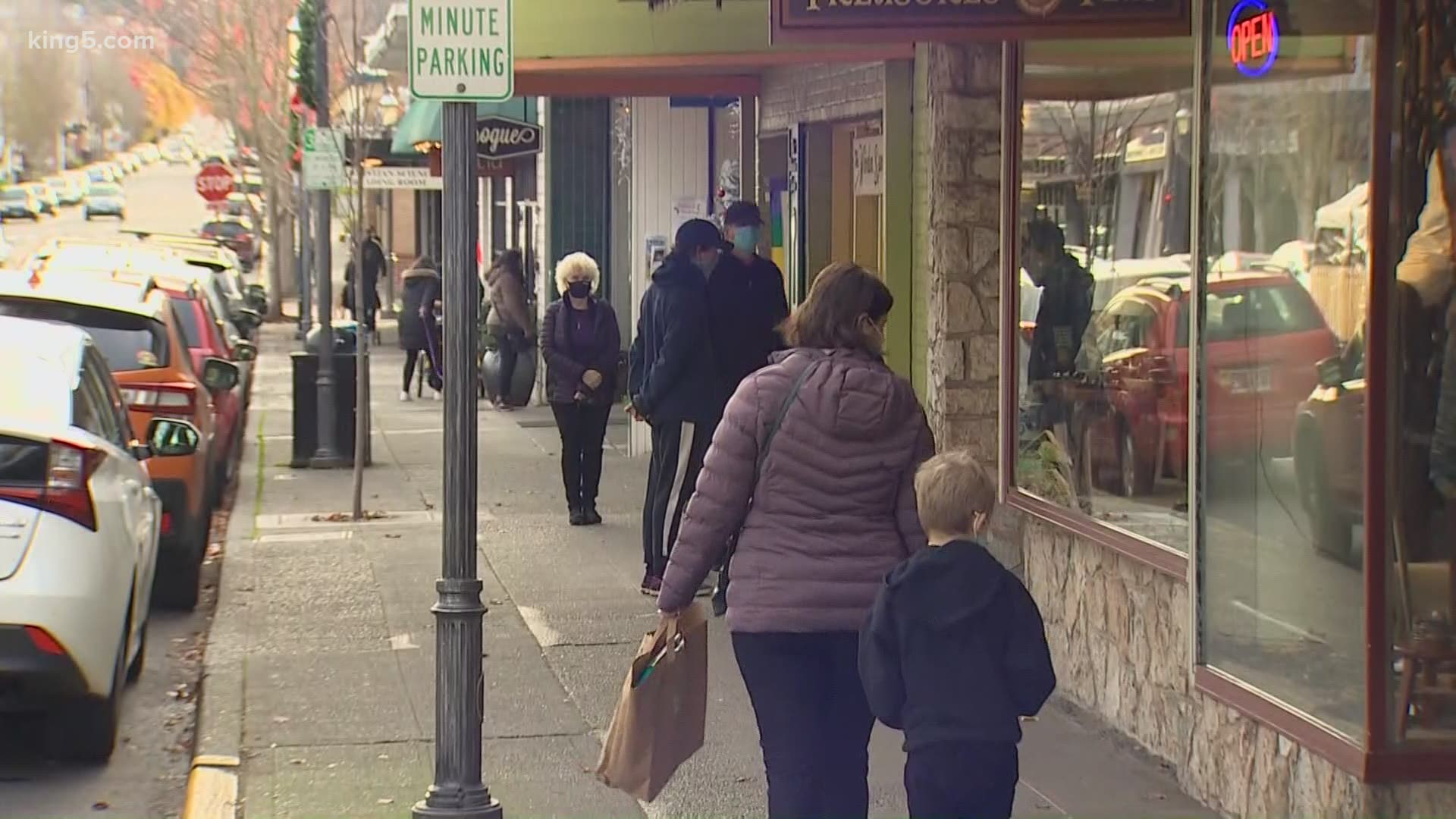 Lines formed at storefronts in downtown Edmonds  as shoppers worked to check items off their holiday shopping lists from small businesses.