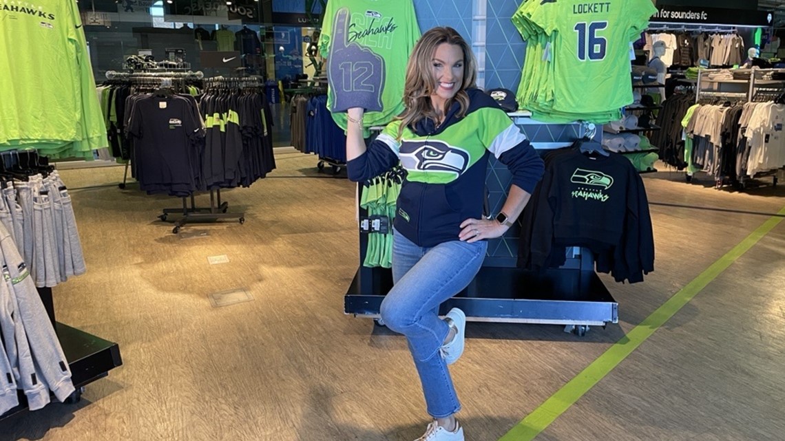 Getting our spirit on at the Seahawks Pro Shop - New Day NW