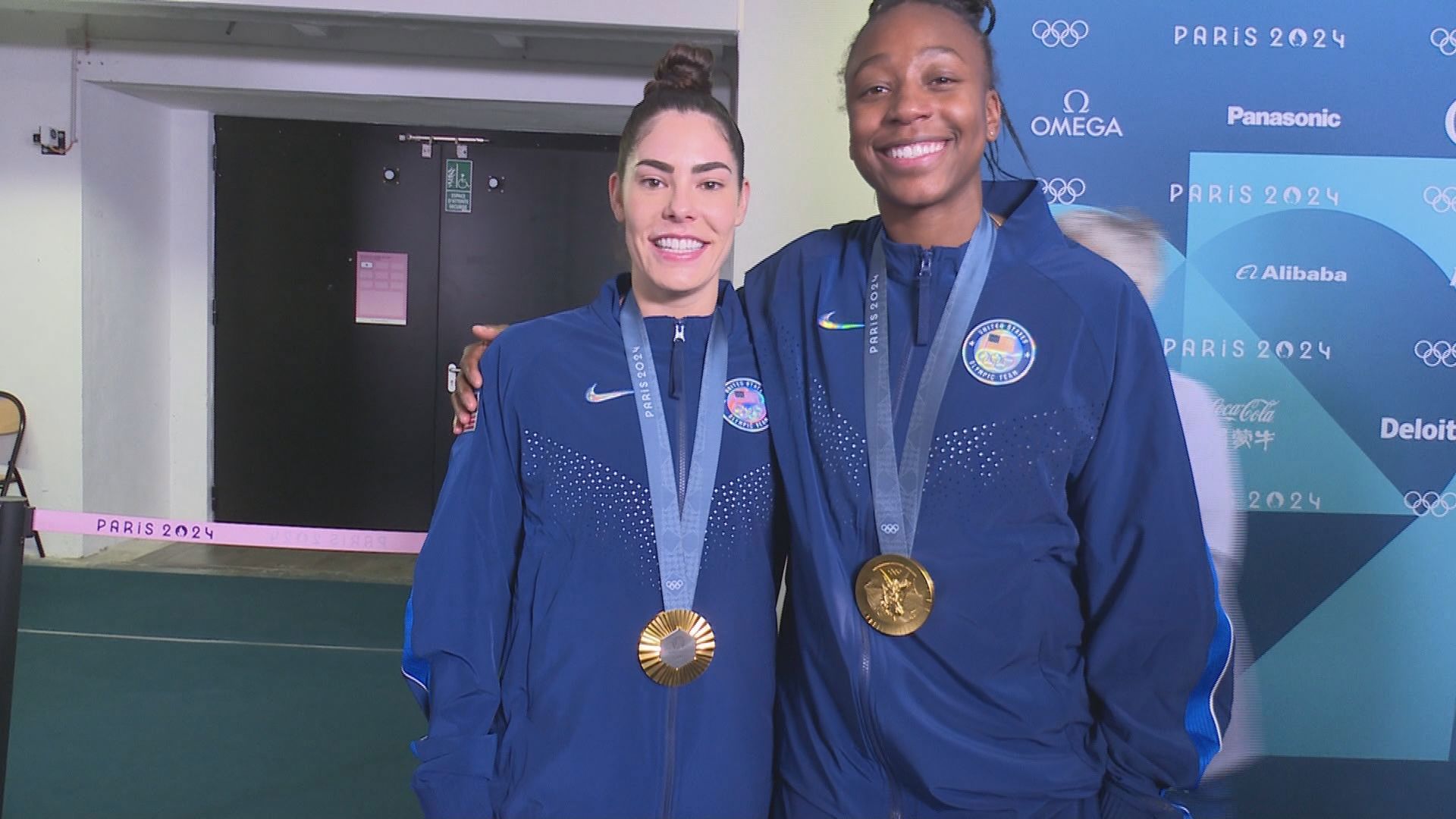 Storm Star Jewell Loyd and former Husky star Kelsey Plum and former storm star Breanna Stewart react to winning gold at Paris Olympics.